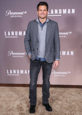 Kristoffer Polaha arrives at the Los Angeles Premiere Of Paramount+'s Original Series 'Landman' Season 1 held at the Paramount Theatre at Paramount Pictures Studios on November 12, 2024 in Hollywood, Los Angeles, California, United States. clipart