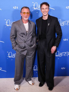 Daniel Craig and Drew Starkey arrive at the Los Angeles Premiere Of A24's 'Queer' held at the Directors Guild of America Theater Complex on November 13, 2024 in Los Angeles, California, United States. clipart