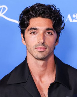 Taylor Zakhar Perez, 13 Kasım 2024 'te Los Angeles, Kaliforniya, ABD' de bulunan Amerika Tiyatro Kompleksi Yönetmenler Birliği 'nde düzenlenen A24' ün 'Queer' inin Los Angeles prömiyerine geldi..