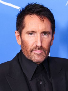 Trent Reznor, 13 Kasım 2024 'te Los Angeles, Kaliforniya, ABD' de bulunan Amerika Tiyatro Kompleksi Yönetmenler Birliği 'nde düzenlenen A24' ün 'Queer' inin Los Angeles prömiyerine geldi.. 