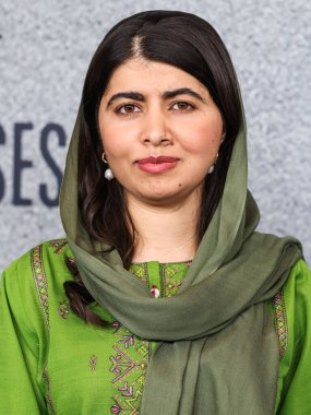 Malala Yousafzai arrives at the Los Angeles Premiere Of Apple Original Films' 'Bread And Roses' held at the Hammer Museum on November 14, 2024 in Los Angeles, California, United States. clipart