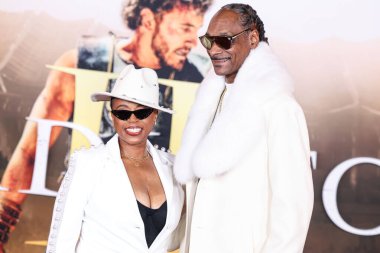 Shante Broadus ve kocası Snoop Dogg (Calvin Broadus Jr.), 18 Kasım 2024 'te Hollywood, Los Angeles, Kaliforniya, ABD' de bulunan TCL Çin Tiyatrosu IMAX 'te düzenlenen Paramount Pictures' Gladyatör II 'nin Los Angeles Premiere' sine geldiler.. 