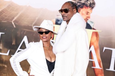 Shante Broadus ve kocası Snoop Dogg (Calvin Broadus Jr.), 18 Kasım 2024 'te Hollywood, Los Angeles, Kaliforniya, ABD' de bulunan TCL Çin Tiyatrosu IMAX 'te düzenlenen Paramount Pictures' Gladyatör II 'nin Los Angeles Premiere' sine geldiler.. 