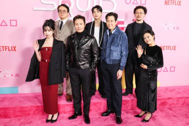 Jo Yu-ri, Lee Seo-hwan, Lee Byung-hun, Yim Si-wan, Lee Jung-jae, Yang Dong-geun and Kang Ae-shim arrive at the Los Angeles Premiere And Fan Event For Netflix's 'Squid Game' Season 2 held at the Los Angeles City College on December 12, 2024 in LA, CA clipart