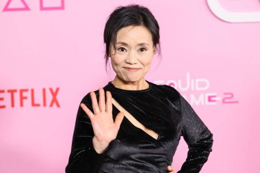 Kang Ae-shim arrives at the Los Angeles Premiere And Fan Event For Netflix's 'Squid Game' Season 2 held at the Los Angeles City College on December 12, 2024 in Los Angeles, California, United States.     clipart