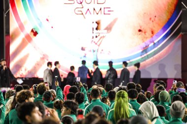 Lee Seo-hwan, Yang Dong-geun, Kang Ae-shim, Lee Jung-jae, Hwang Dong-hyuk, Lee Byung-hun, Yim Si-wan and Jo Yu-ri speak at Los Angeles Premiere And Fan Event For Netflix's 'Squid Game' Season 2 held at Los Angeles City College on December 12, 2024 clipart