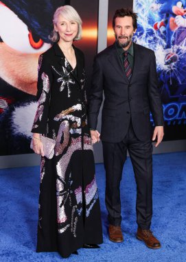 Alexandra Grant and boyfriend Keanu Reeves arrive at the Los Angeles Premiere Of Paramount Pictures' 'Sonic The Hedgehog 3' held at the TCL Chinese Theatre IMAX on December 16, 2024 in Hollywood, Los Angeles, California, United States.  clipart