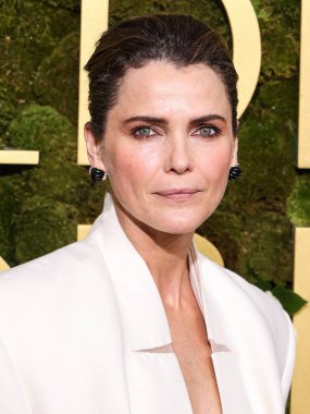 Keri Russell 'ın Stéphane Rolland elbisesi, Aquazzura ayakkabıları, Tyler Ellis el çantası ve Lagos mücevherleri 5 Ocak 2025' te Beverly Hills, Los Angeles, Kaliforniya 'da düzenlenen 82.