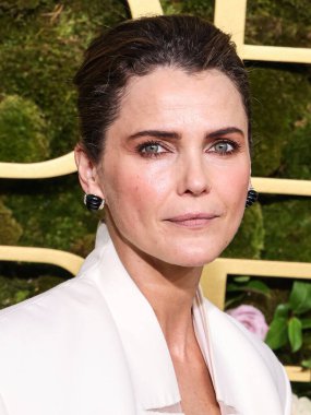 Keri Russell 'ın Stéphane Rolland elbisesi, Aquazzura ayakkabıları, Tyler Ellis el çantası ve Lagos mücevherleri 5 Ocak 2025' te Beverly Hills, Los Angeles, Kaliforniya 'da düzenlenen 82.