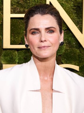 Keri Russell 'ın Stéphane Rolland elbisesi, Aquazzura ayakkabıları, Tyler Ellis el çantası ve Lagos mücevherleri 5 Ocak 2025' te Beverly Hills, Los Angeles, Kaliforniya 'da düzenlenen 82.
