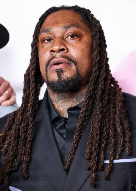 Marshawn Lynch arrives at the Los Angeles Premiere Of Universal Pictures' 'Love Hurts' held at the TCL Chinese Theatre IMAX on February 3, 2025 in Hollywood, Los Angeles, California, United States.         clipart