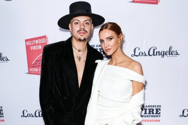 Evan Ross, Ashlee Simpson Ross arrive at Los Angeles Magazine Presents: Book Launch Party For 'Hollywood Virgin' to Benefit the Los Angeles Fire Department Foundation held at The Abbey Food and Bar on February 5, 2025 in West Hollywood, LA, CA, USA. clipart