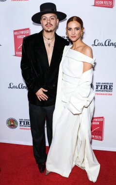 Evan Ross, Ashlee Simpson Ross arrive at Los Angeles Magazine Presents: Book Launch Party For 'Hollywood Virgin' to Benefit the Los Angeles Fire Department Foundation held at The Abbey Food and Bar on February 5, 2025 in West Hollywood, LA, CA, USA. clipart