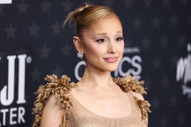 Ariana Grande Butera wearing a Dior dress and Jimmy Choo shoes arrives at the 30th Annual Critics' Choice Awards held at The Barker Hangar on February 7, 2025 in Santa Monica, Los Angeles, California, United States. clipart