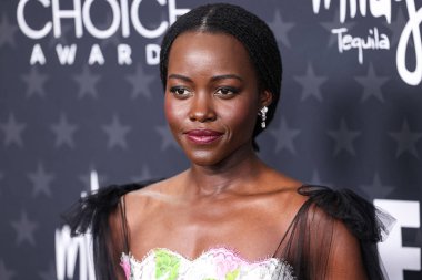 Chanel giyen Lupita Nyongo, 7 Şubat 2025 'te Santa Monica, Los Angeles, Kaliforniya, ABD' de düzenlenen Barker Hangarı 'nda düzenlenen 30. Yıllık Eleştirmenler Seçimi Ödülleri' ne geldi.. 