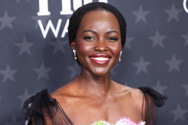 Chanel giyen Lupita Nyongo, 7 Şubat 2025 'te Santa Monica, Los Angeles, Kaliforniya, ABD' de düzenlenen Barker Hangarı 'nda düzenlenen 30. Yıllık Eleştirmenler Seçimi Ödülleri' ne geldi.. 