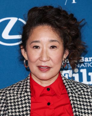 Sandra Oh arrives at the Virtuosos Award during the 40th Santa Barbara International Film Festival at The Arlington Theatre on February 09, 2025 in Santa Barbara, California, United States. clipart