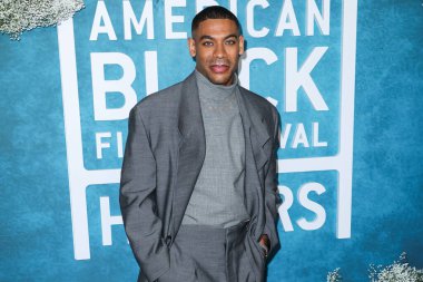 Aaron Pierre, 17 Şubat 2025 'te ABD' nin Kaliforniya eyaletinin Los Angeles kentinde bulunan Beverly Hills kentindeki SLS Hotel 'de düzenlenen 7. Geleneksel Amerikan Siyahi Film Festivali' ne (ABFF) geldi..