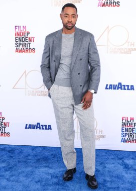 Jay Ellis wearing a Canali blazer arrives at the 40th Annual Film Independent Spirit Awards 2025 held at the Santa Monica Beach on February 22, 2025 in Santa Monica, Los Angeles, California, United States.     clipart