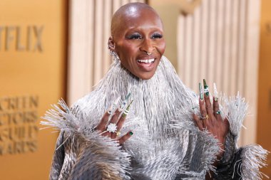 Cynthia Erivo Givenchy Haute Couture elbisesi, Christian Louboutin ayakkabıları ve Bucherer mücevherleri giyerek 23 Şubat 2025 'te Los Angeles, Kaliforniya' da bulunan Shrine Auditorium ve Expo Hall 'da düzenlenen 31.  