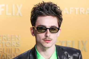 Timothee Chalamet tam bir Chrome Hearts bakışını takmış ve Cartier saati, 23 Şubat 2025 'te ABD' nin Kaliforniya eyaletinin Los Angeles kentindeki Shrine Oditoryum ve Fuar Salonu 'nda düzenlenen 31.. 