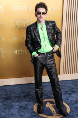 Timothee Chalamet tam bir Chrome Hearts bakışını takmış ve Cartier saati, 23 Şubat 2025 'te ABD' nin Kaliforniya eyaletinin Los Angeles kentindeki Shrine Oditoryum ve Fuar Salonu 'nda düzenlenen 31.. 