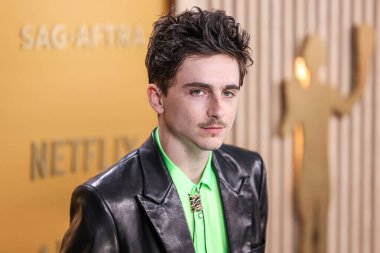 Timothee Chalamet tam bir Chrome Hearts bakışını takmış ve Cartier saati, 23 Şubat 2025 'te ABD' nin Kaliforniya eyaletinin Los Angeles kentindeki Shrine Oditoryum ve Fuar Salonu 'nda düzenlenen 31.. 