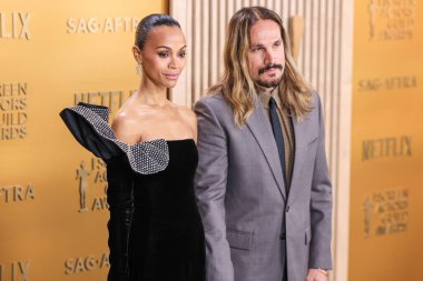 Zoe Saldana ve kocası Marco Perego, 23 Şubat 2025 'te ABD' nin Kaliforniya eyaletinin Los Angeles kentinde düzenlenen Shrine Konser Salonu ve Fuar Salonu 'nda düzenlenen 31..