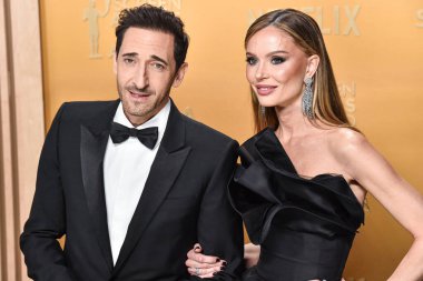 Adrien Brody ve Georgina Chapman, 23 Şubat 2025 'te ABD' nin Kaliforniya eyaletinin Los Angeles kentinde düzenlenen Shrine Konser Salonu ve Fuar Salonu 'nda düzenlenen 31..