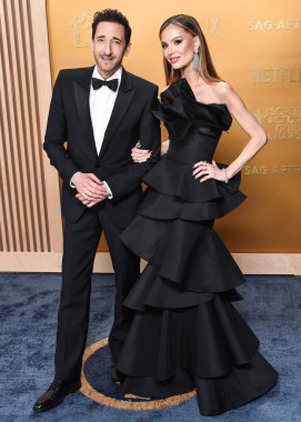 Adrien Brody ve Georgina Chapman, 23 Şubat 2025 'te ABD' nin Kaliforniya eyaletinin Los Angeles kentinde düzenlenen Shrine Konser Salonu ve Fuar Salonu 'nda düzenlenen 31..