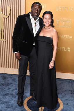 Edwin Lee Gibson ve Dina Pascua, 23 Şubat 2025 'te ABD' nin Kaliforniya eyaletinin Los Angeles kentindeki Shrine Auditorium ve Expo Hall 'da düzenlenen 31..