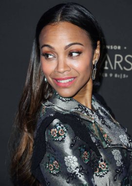 Zoe Saldana, 2 Mart 2025 Pazar günü 97. Yıllık Akademi Ödülleri 'nde Emilia Perez için En İyi Yardımcı Kadın Oyuncu dalında Oscar kazandı. BATI HOLYWOOD, LOS ANGELES, CALIFORNIA, ABD - Şubat 06: Amerikalı aktris Zoe Saldana        