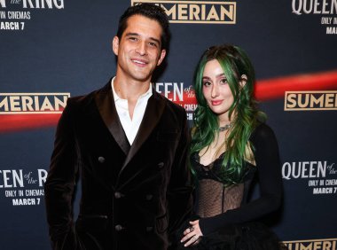 Tyler Posey ve eşi Phem (Olivia Marsico), 6 Mart 2025 'te Los Angeles, Kaliforniya, ABD' deki Los Angeles 'ta gerçekleştirilen Intrinsic Value Films' in ve Sümer 'in Queen of the Ring' in galasına geldiler..