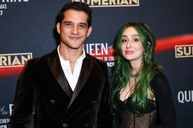 Tyler Posey ve eşi Phem (Olivia Marsico), 6 Mart 2025 'te Los Angeles, Kaliforniya, ABD' deki Los Angeles 'ta gerçekleştirilen Intrinsic Value Films' in ve Sümer 'in Queen of the Ring' in galasına geldiler..