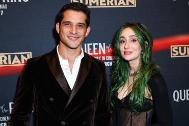 Tyler Posey ve eşi Phem (Olivia Marsico), 6 Mart 2025 'te Los Angeles, Kaliforniya, ABD' deki Los Angeles 'ta gerçekleştirilen Intrinsic Value Films' in ve Sümer 'in Queen of the Ring' in galasına geldiler..