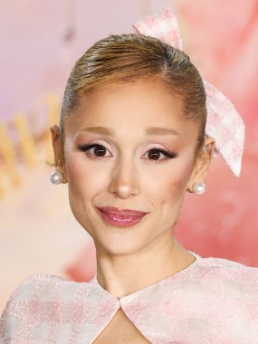 Ariana Grande Butera wearing custom Thom Browne arrives at the Los Angeles Premiere Of Universal Pictures' 'Wicked' held at the Dorothy Chandler Pavilion at The Music Center on November 9, 2024 in Los Angeles, California, United States. clipart