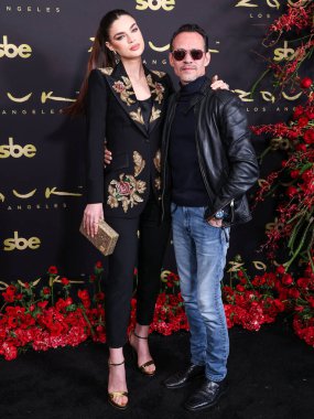 Nadia Ferreira and husband Marc Anthony arrive at the Zouk Los Angeles Grand Opening Preview held at Zouk Los Angeles on March 13, 2025 in Los Angeles, California, United States. clipart