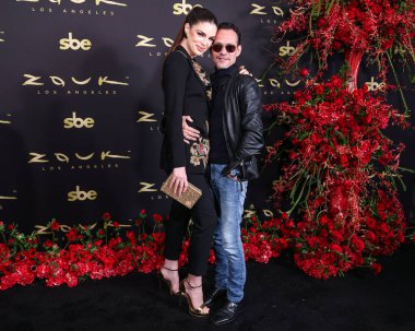 Nadia Ferreira and husband Marc Anthony arrive at the Zouk Los Angeles Grand Opening Preview held at Zouk Los Angeles on March 13, 2025 in Los Angeles, California, United States. clipart