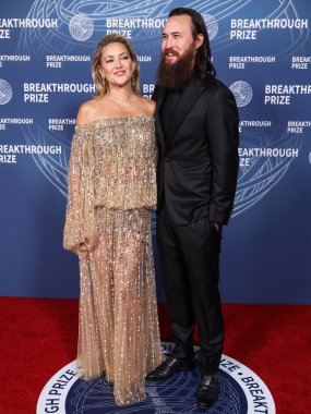 Amerikalı aktris Kate Hudson ve erkek arkadaşı Danny Fujikawa, 5 Nisan 2025 'te ABD' nin Los Angeles, Kaliforniya eyaletindeki Barker Hangar 'da düzenlenen 11..     