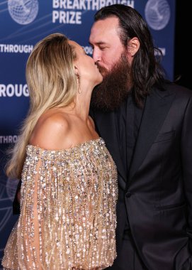 Amerikalı aktris Kate Hudson ve erkek arkadaşı Danny Fujikawa, 5 Nisan 2025 'te ABD' nin Los Angeles, Kaliforniya eyaletindeki Barker Hangar 'da düzenlenen 11..     