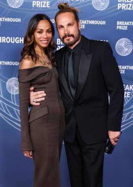 Zoe Saldana ve kocası Marco Perego, 5 Nisan 2025 'te Santa Monica, Los Angeles, Kaliforniya, ABD' de Barker Hangar 'da düzenlenen 11..
