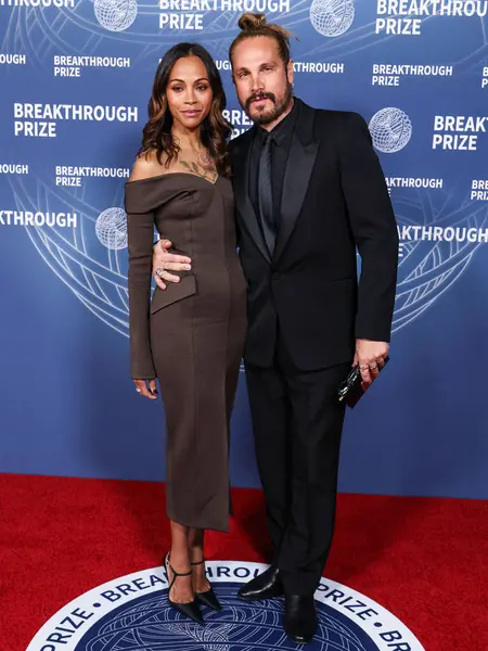 Zoe Saldana ve kocası Marco Perego, 5 Nisan 2025 'te Santa Monica, Los Angeles, Kaliforniya, ABD' de Barker Hangar 'da düzenlenen 11..
