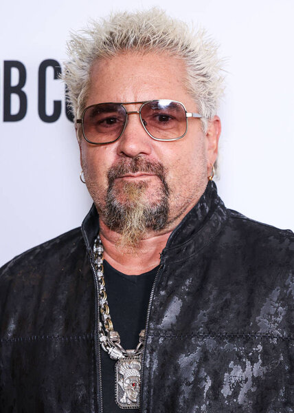 American restaurateur and author Guy Fieri arrives at the Los Angeles Premiere Of Lionsgate's 'Mob Cops' held at the Harmony Gold Theater on April 23, 2025 in Hollywood, Los Angeles, California, United States.     