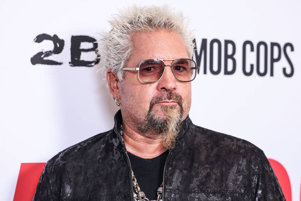 American restaurateur and author Guy Fieri arrives at the Los Angeles Premiere Of Lionsgate's 'Mob Cops' held at the Harmony Gold Theater on April 23, 2025 in Hollywood, Los Angeles, California, United States.     
