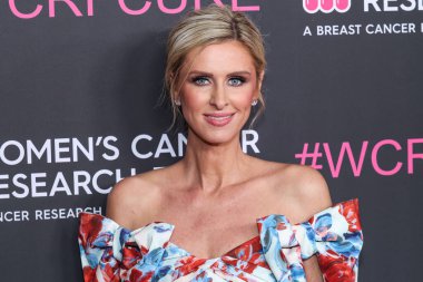 Amerikalı sosyete ve moda tasarımcısı Nicky Hilton Rothschild, 28 Nisan 2025 'te Beverly Hilton Oteli' nde düzenlenen Kadın Kanser Araştırma Fonu 'nun Unutulmaz Akşam Yardım Galası 2025' e geldi.    