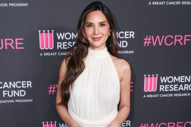 Amerikalı aktris Olivia Munn, 28 Nisan 2025 'te Beverly Hilton Oteli' nde düzenlenen Kadın Kanser Araştırma Fonu 'nun Unutulmaz Akşam Yardım Galası 2025' e geldi..                