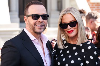Boston Blue 'dan Donnie Wahlberg ve eşi Jenny McCarthy, CBSFEST 2025-2026 yıllarında Paramount Stüdyoları' nda 7 Mayıs 2025 'te ABD' nin Los Angeles kentinde düzenlenen duyuruya geldiler..            