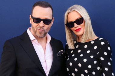Boston Blue 'dan Donnie Wahlberg ve eşi Jenny McCarthy, CBSFEST 2025-2026 yıllarında Paramount Stüdyoları' nda 7 Mayıs 2025 'te ABD' nin Los Angeles kentinde düzenlenen duyuruya geldiler..            