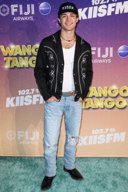 Amerikalı aktör, şarkıcı, söz yazarı ve gitarist Asher Angel, 10 Mayıs 2025 tarihinde Huntington City Beach, Orange County, California, ABD 'de düzenlenen Fiji Airways tarafından sunulan iHeartRadio 102.7 KIIS FM Wango 2025' e ulaştı.