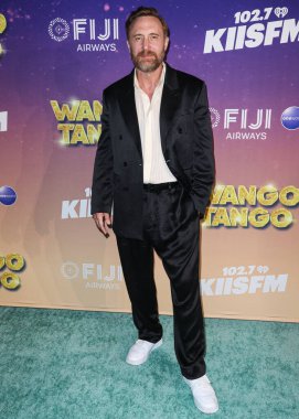 Fransız DJ ve kayıt yapımcısı David Guetta, Fiji Airways tarafından sunulan 102.7 KIIS FM Wango Tango 2025 tarihli iHeartRadio 'ya 10 Mayıs 2025 tarihinde Huntington City Beach, Orange County, Kaliforniya, ABD' de geldi..